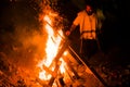 Jewish man by bonfire in mt meron, israel