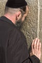 A jewish man is praying in Jerusalem