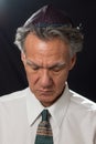 Jewish Rabbi, praying while wearing his Yamaka