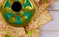 Jewish matzah, kiddush and seder with text in hebrew egg, bone, herbs, karpas, chazeret and charoset. Passover concept Royalty Free Stock Photo