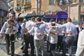 Jewish men celebrate Simchat Torah