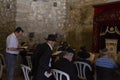 Praying in Wilson`s Arch, the covered section of the Western Wall