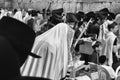 Religious men praying at the wailing wall in Jerusalem during Sukkot