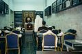 Jewish Men Praying with Kippah, Tallit and Tefillin in Synagogue. Royalty Free Stock Photo