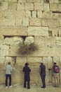 Jewish men praying at the sacred Wailing Wall, Western Wall, Jerusalem, Israel Royalty Free Stock Photo