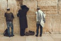 Jewish men praying at the sacred Wailing Wall, Western Wall, Jerusalem Royalty Free Stock Photo