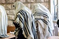 Jewish men praying in a synagogue with Tallit Royalty Free Stock Photo