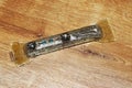 Jewish Mezuzah decorated with bronze elements and Hebrew letter - Shin. Mezuzah is affixed to the doorpost in Jewish homes