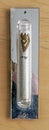 A Jewish Mezuzah which is mounted on the side post of a door way.