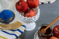 A jewish new year with honey for the apple and pomegranate holiday of Rosh Ha Shana Royalty Free Stock Photo