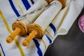 Jewish Orthodox holidays, during prayer items prayer shawl tallit with torah scroll Royalty Free Stock Photo