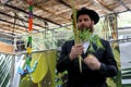 Jewish Orthodox Rabbi blessing on the Four Species in a Sukkah