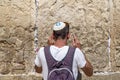 Jewish people praying against the Western Wall in Jerusalem Royalty Free Stock Photo