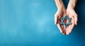 A Jewish person holding the Star of David against a blue background