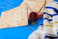 Jewish pesach attributes celebrated with kosher wine cup matzah flatbread unleavened bread during a passover Royalty Free Stock Photo