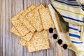 Jewish Passover attributes in composition a four cup of wine and passover matzah Royalty Free Stock Photo