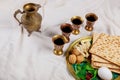 Jewish pesah holiday unleavened bread matzoh with kiddush four cup of wine