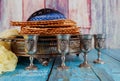 Jewish pesah holiday unleavened bread matzoh with kiddush four cup of wine and kipah Royalty Free Stock Photo