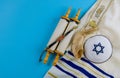 Jewish prayer book with torah scroll and shofar horn, prayer shawl tallit Royalty Free Stock Photo