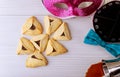 Jewish purim hamantaschen homemade cookies with purim mask and purim kippah red kosher wine