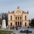 Jewish religious building synagogue and Kossuth Lajos statue on Kossuth Square in Pecs, Hungary, Europe