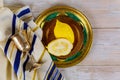 Jewish religious yellow etrog citron is used during holiday of Sukkot and tallit