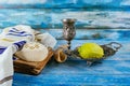 Jewish ritual festival of Sukkot in the jewish religious symbol Etrog, lulav, hadas, arava tallit praying book kippah and shofar Royalty Free Stock Photo