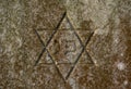 Jewish Star of David on the tombstone. Symbol of the Jews. Close up. Detail Royalty Free Stock Photo