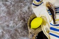 Jewish ritual Sukkot festival in the jewish religious symbol Etrog, lulav, hadas, arava tallit praying book kippah and shofar Royalty Free Stock Photo