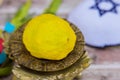 In the Jewish tradition, the feast of Tabernacles has an etrog ritual citrus fruit which symbolizes the Jewish holiday