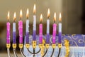 Jewish tradition of Hanukkah celebration family religious holiday symbols lighting hanukkiah menorah candles to Royalty Free Stock Photo
