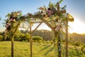 Jewish traditions wedding ceremony. Wedding canopy chuppah or huppah with golden light Royalty Free Stock Photo