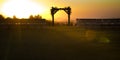 Jewish wedding chuppah against the golden sunset