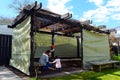 Jewish woman and child visiting their family Sukkah Royalty Free Stock Photo