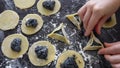 Jewish woman preparing many Hamantash cookies