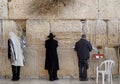 Jews worship at the stones of the Western Wall Royalty Free Stock Photo