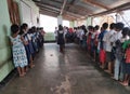 school students stand in line for prayer in a primary school in West Bengal, India Royalty Free Stock Photo