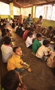 Mid day meal program, in an Indian government initiative, is being running in a primary school. Pupils are taking their meal.