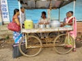 Jhargram, West Bengal, India - May 05, 2018: a street food vendor was selling edli, a south Indian food bedside the