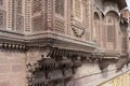 Jharokha, stone window projecting from the wall face of a building, in an upper story, overlooking Mehrangarh fort, Jodhpur,