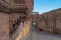 Jharokha, stone window projecting from the wall face of a building, in an upper story, overlooking Mehrangarh fort, Jodhpur,