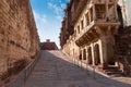 Jharokha, stone window projecting from the wall face of a building, in an upper story, overlooking Mehrangarh fort, Jodhpur,