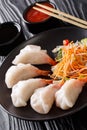 Jiaozi dumplings with whole shrimps with fresh vegetable salad c