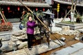 Jie Zi, China: Visitor Posing with Sculpture Royalty Free Stock Photo