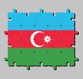 Jigsaw puzzle of Azerbaijan flag in blue red and green with a white crescent and big star. Royalty Free Stock Photo