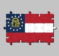 Jigsaw puzzle of Georgia flag in red white red, blue canton containing a ring of stars encompassing the coat of arms.