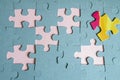 Jigsaw puzzle with missing pieces and one mismatched piece Royalty Free Stock Photo