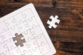 Jigsaw puzzle with one missing piece left to complete Royalty Free Stock Photo