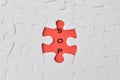 Jigsaw puzzle over red background written with SOP stands for Standard Operating Procedure Royalty Free Stock Photo