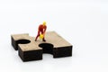 Jigsaw puzzle piece on the jigsaw board, image use for solving problems, background concept